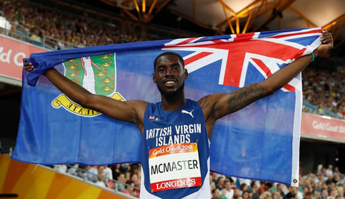  Kyron McMaster celebrates after winning gold in the 400m hurdles at the Commonwealth Games on the Gold Coast. Photograph: Paul Childs/Reuters