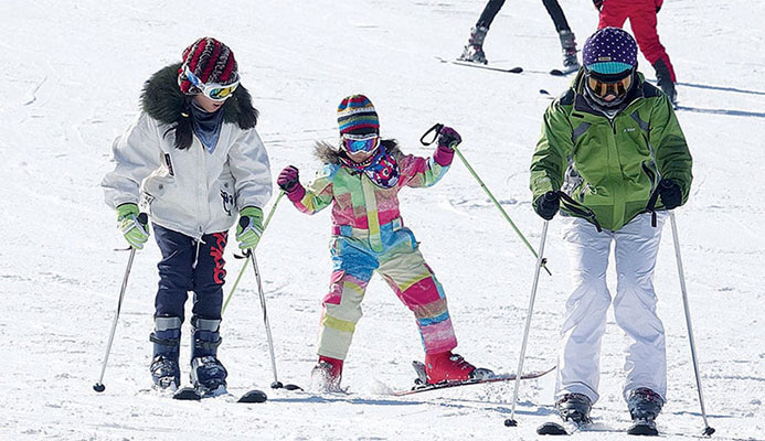 Snowball effect: ski resorts and skating rinks across the country have been booming in recent years as more and more Chinese choose to spend holidays and leisure time in areas noted for their winter sports activities CREDIT: LIU DEBIN/FOR CHINA DAILY