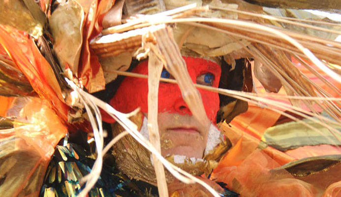 Moko Somokow designer Alan Vaughan is intense as Sun rises over the Sinnerman in the bands†Palace of the Peacock at Victoria Square, Woodbrook on Carnival Tuesday. PHOTO BY SUREASH CHOLAI