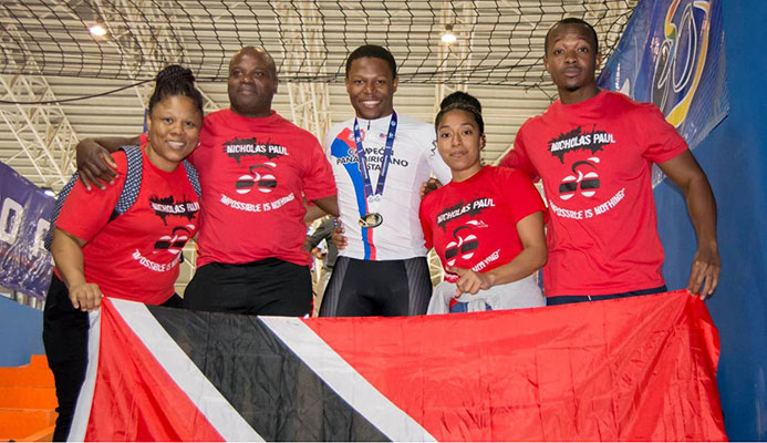 Family and friends of Nicholas Paul, centre, celebrate his gold medal performance in the Men's Sprint event at the Cochabamba Veldrome in Bolivia on Saturday night. (Photo courtesy Bolivia's Ministry of Sport)