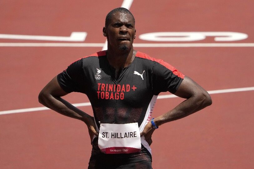 INJURED ON THIRD RELAY LEG:Dwight St Hillaire. —Photo: AP