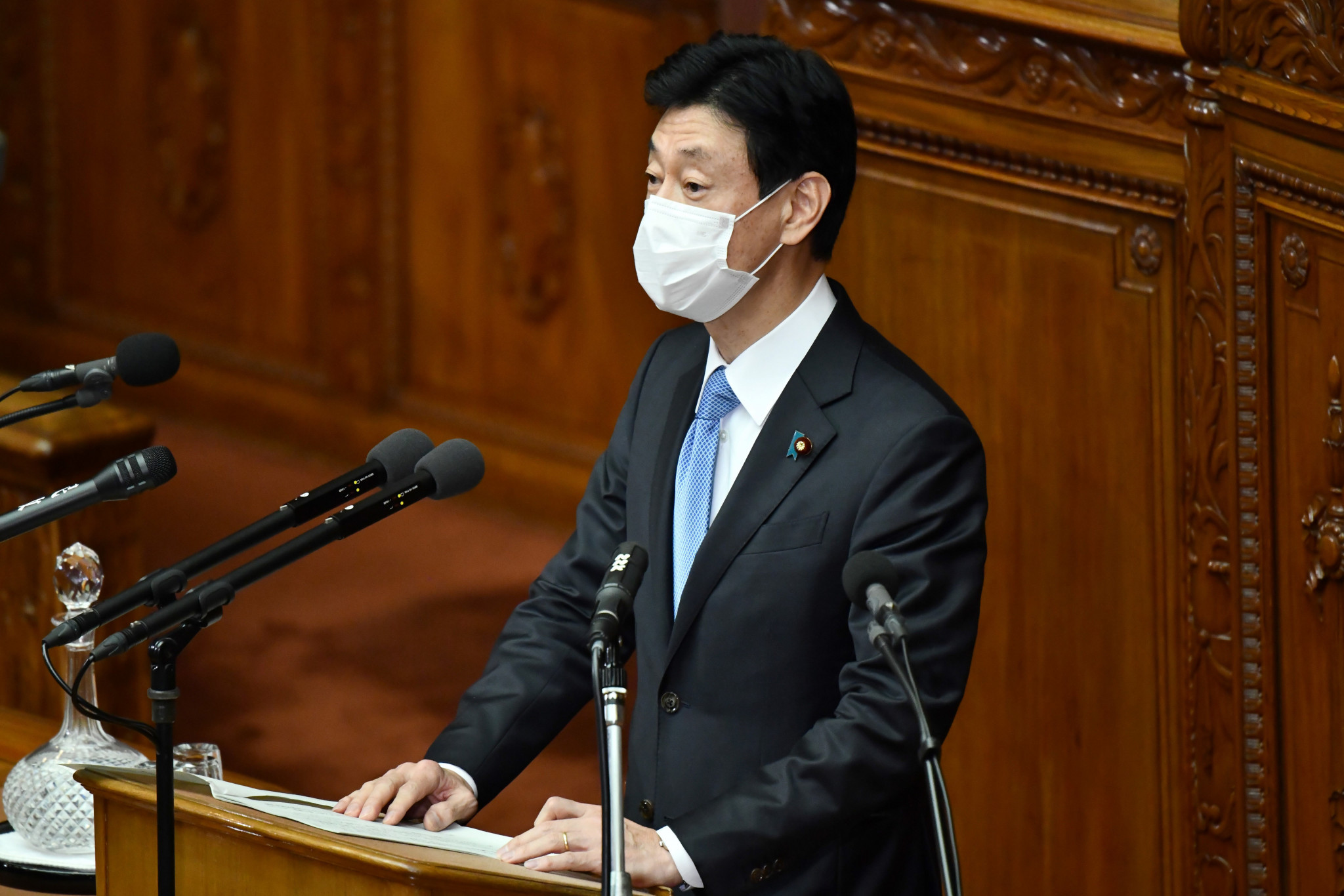 Yasutoshi Nishimura reportedly met with officials from the NPB and the J-League ©Getty Images