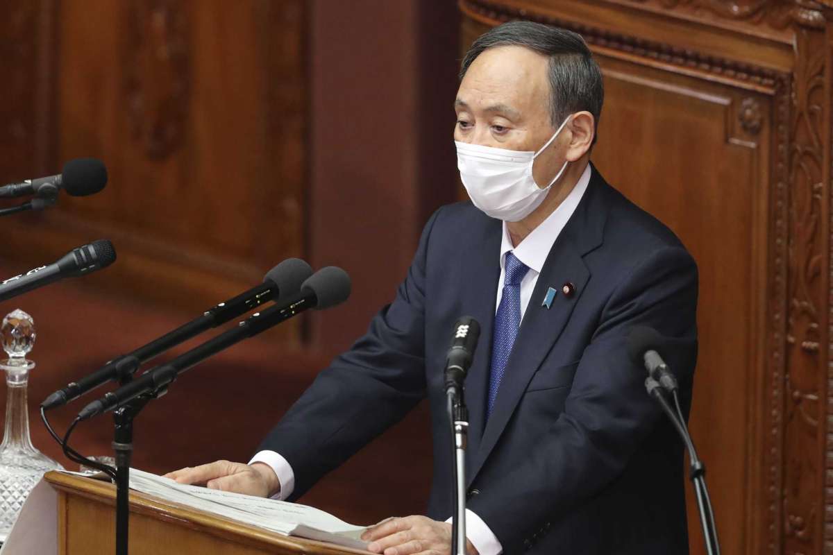 Japanese Prime Minister Yoshihide Suga delivers a policy speech during an ordinary Diet session at the upper house of parliament in Tokyo, Monday, Jan. 18, 2021.Koji Sasahara/AP