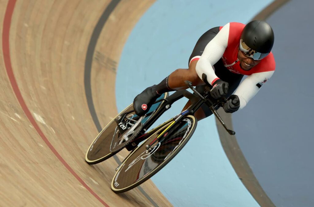 Nicholas Paul of Trinidad and Tobago rides in the men's 1000m time trial final during the Commonwealth Games track cycling at Lee Valley VeloPark in London, England on Monday. (AP PHOTO) - via newsday.co.tt