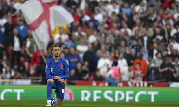 Jordan Henderson takes the knee before England’s friendly with Switzerland at Wembley on Saturday. Photograph: Alastair Grant/AP