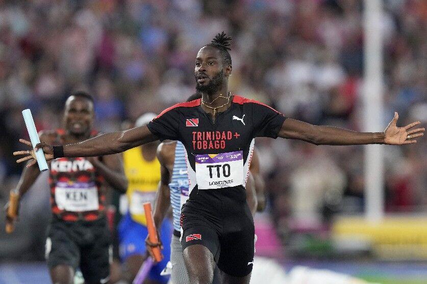 MORE PRECIOUS METAL: T&T’s Jereem Richards, running the anchor leg, begins to celebrate victory in the Men’s 4 x 400 metres relay in the Alexander Stadium, at the Commonwealth Games in Birmingham, England, on Sunday. Richards, Asa Guevara, Dwight St Hillaire and Machel Cedenio brought home the gold for Team TTO. —Photo: AP (via trinidadexpress.com)