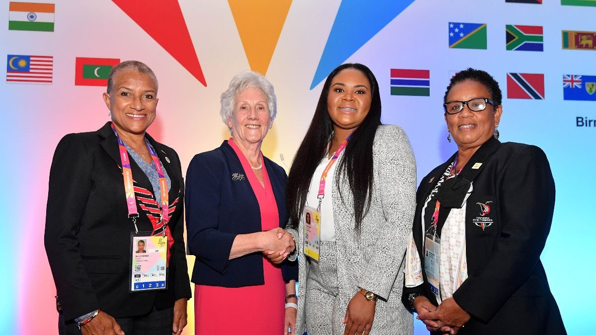 TTOC President Diane Henderson, far left, and CGF President Dame Louise Martin, second left, signed a hosting agreement today for the 2023 Commonwealth Youth Games ©CGF