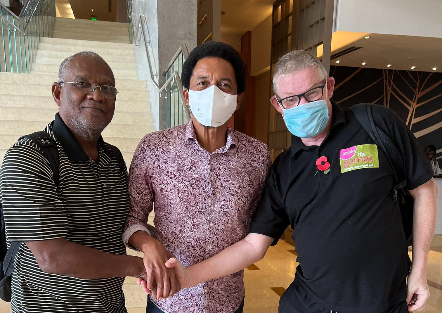 CANOC Secretary Keith Joseph (left) and President Brian Lewis(centre) with Philip Barker in Port of Spain ©CANOC (Image obtained from: insidethegamez.biz)