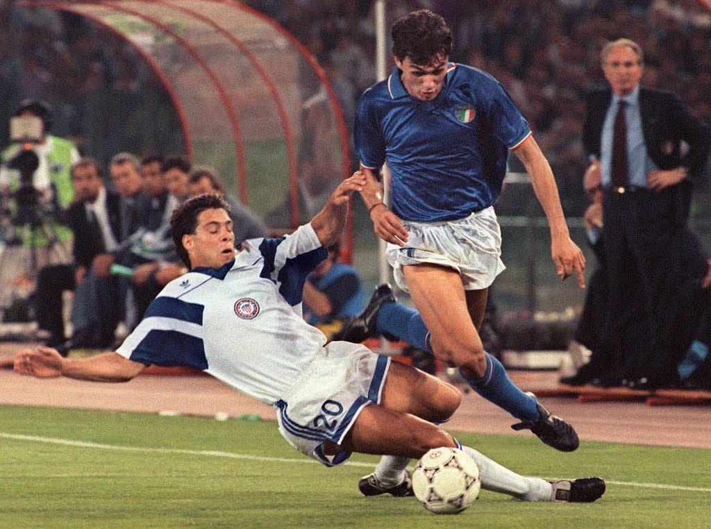 In this June 14, 1990 file photo, Italian defender Paolo Maldini (R) is tackled by US midfielder Paul Caliguri during their 90 World Cup match in Rome. - (Image obtained at newsday.co.tt)