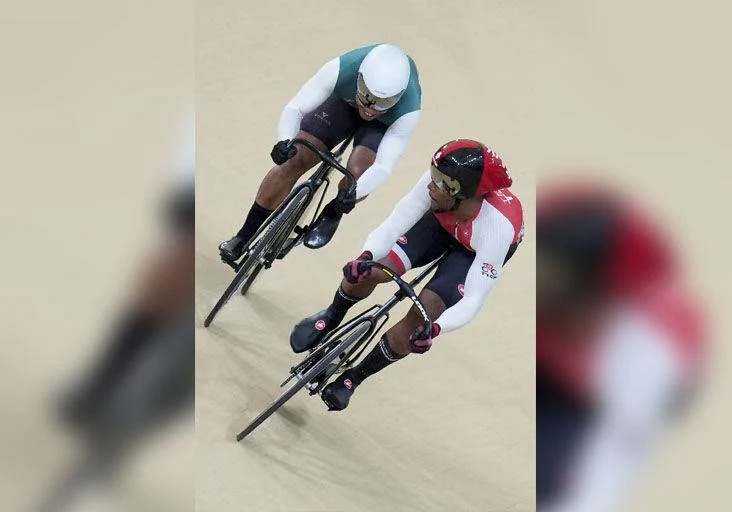 ‘CAT AND MOUSE’: Trinidad and Tobago’s Nicholas Paul, right, appears to be displaying some  gamesmanship against Suriname’s Jair Tjon En Fa in yesterday’s men’s sprint final at the Pan American Games in Santiago, Chile. Paul, the defending  champion from the corresponding event in Lima, Peru, four years ago, repeated by again copping gold after prevailing in straight rides. —Photo: AP (Image obtained at trinidadexpress.com)